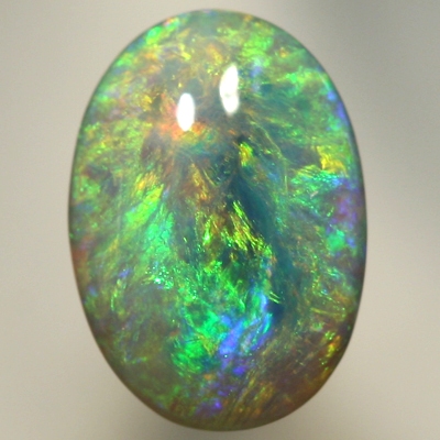 SOLID SEMI BLACK OPAL Pretty opal with orange bursting into greens and blues. SEE VIDEO